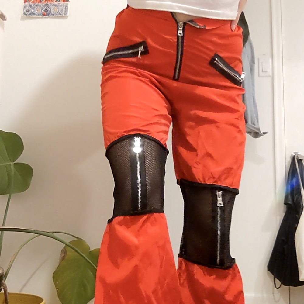 Red meshy rainpants